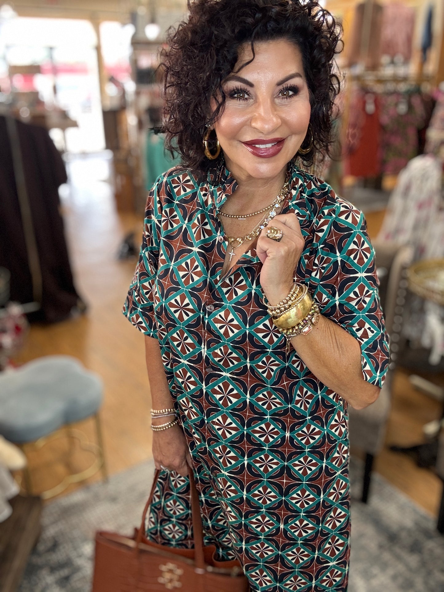 Geometric print short sleeve midi dress featuring button closure at front