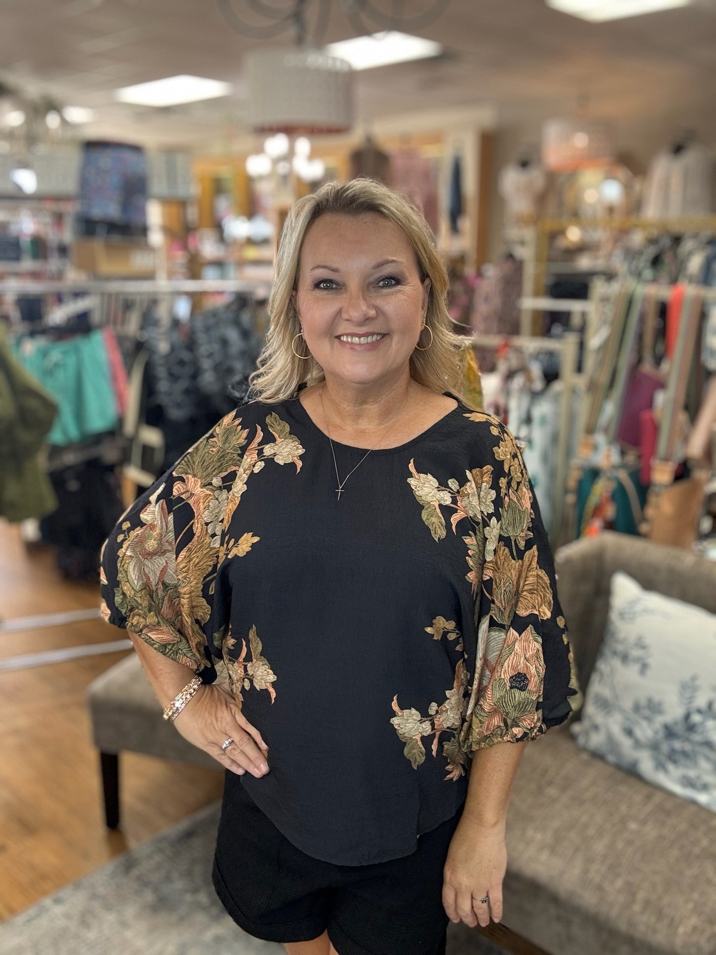 Botanical print ¾ sleeve puff top featuring textured fabric