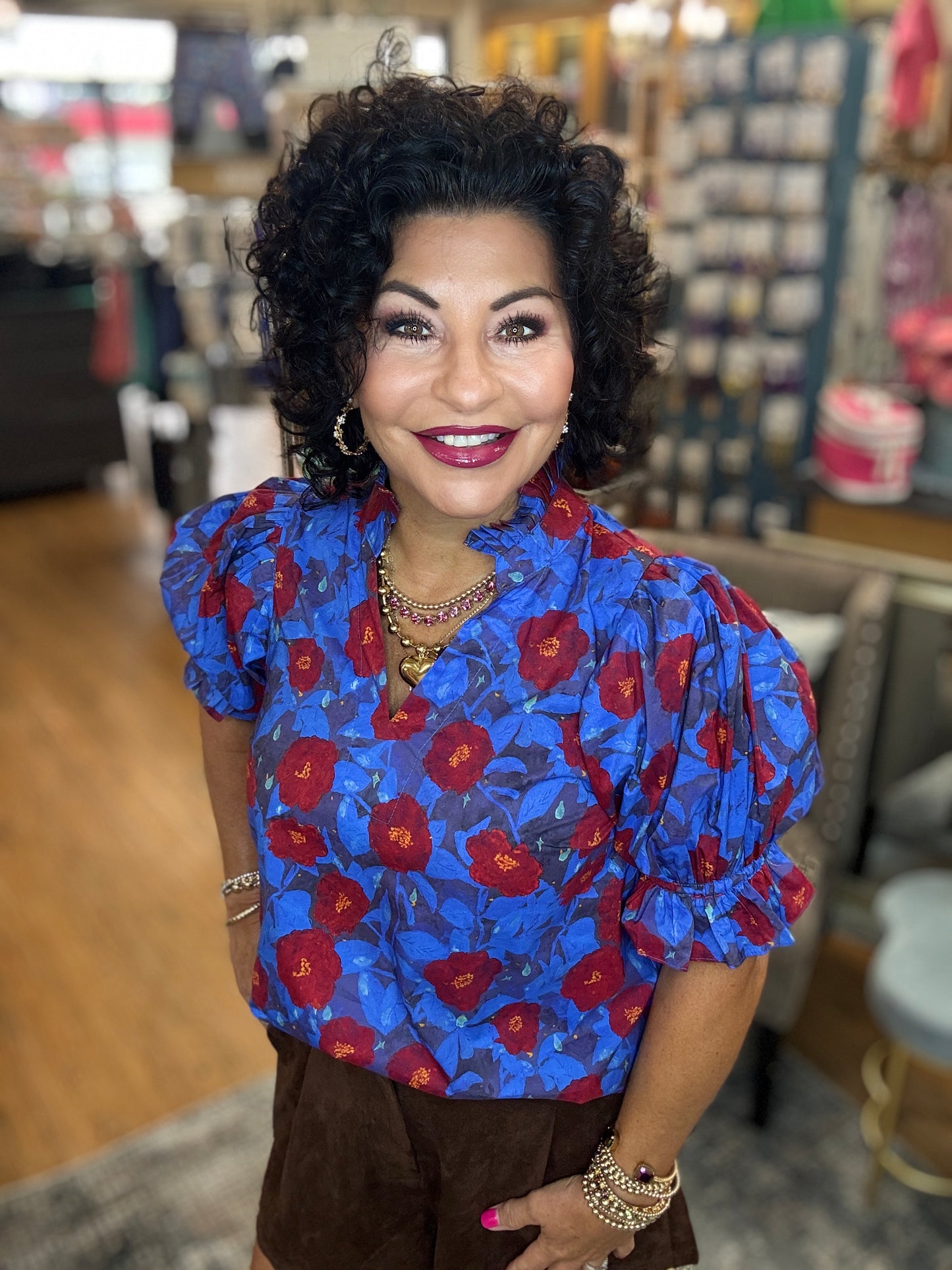Floral pattern short puff sleeve pullover top featuring pleated ruffle V-neck