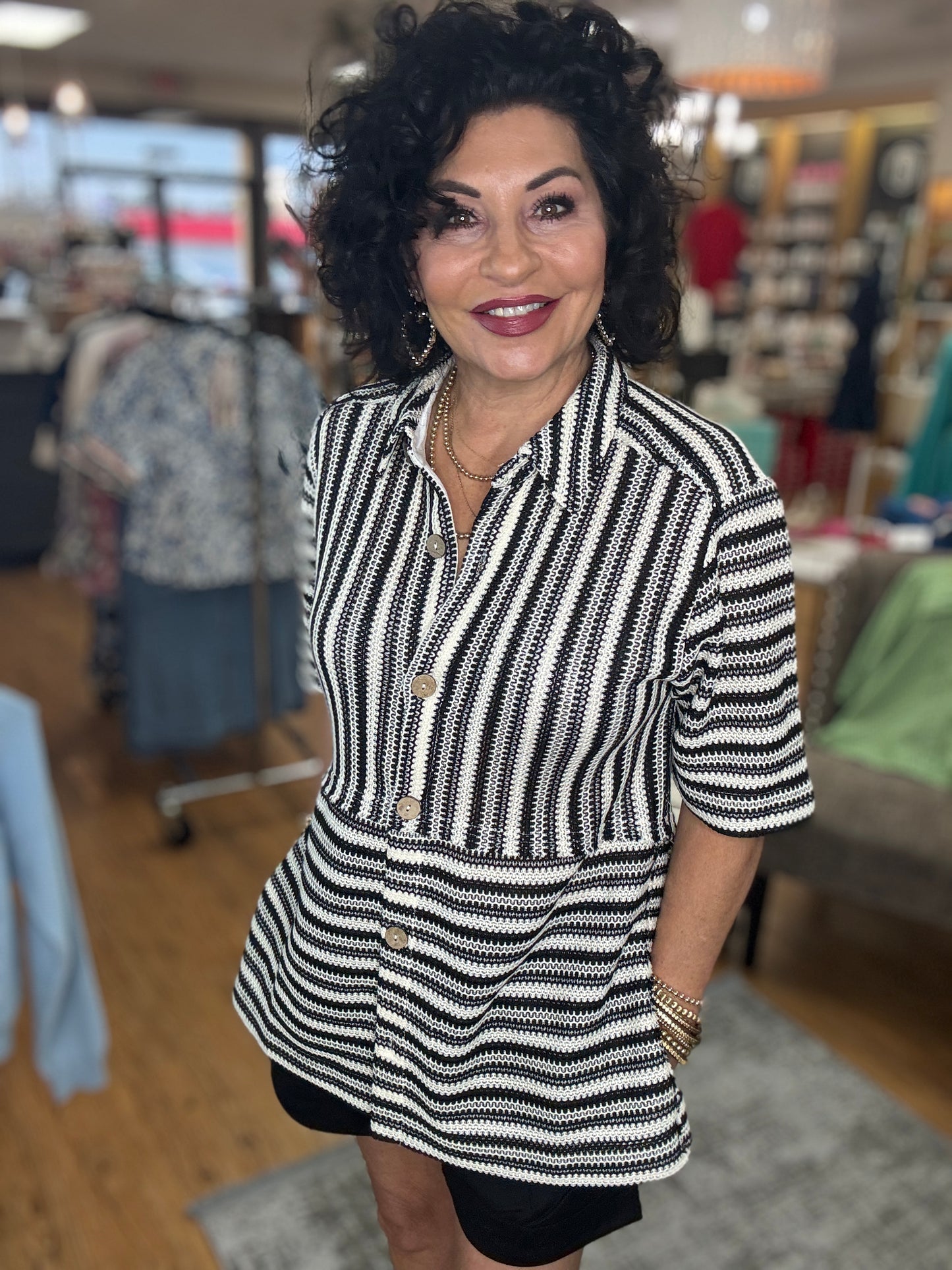 Striped crochet shirt top with collared neck, front buttoned closure, short sleeves and side slit detailing.