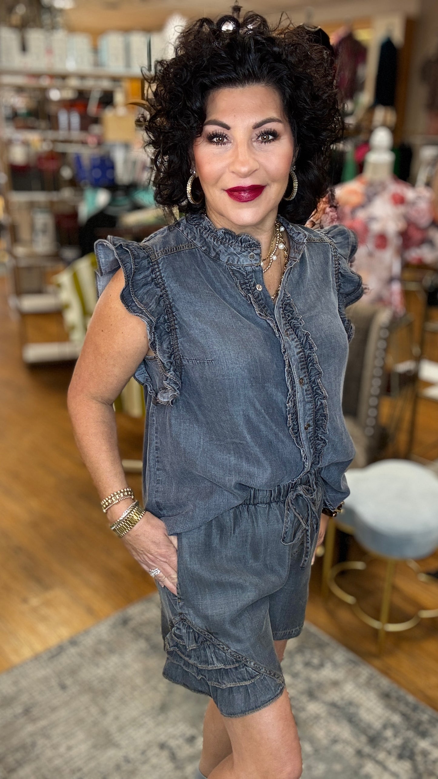 Ruffle Accent Sleeveless Chambray Shirt