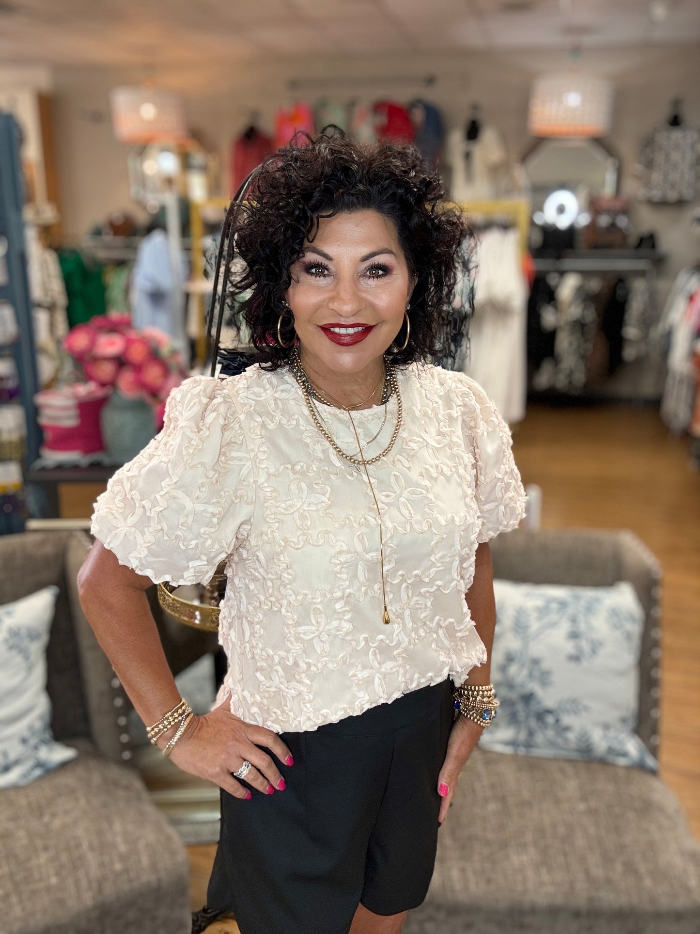 Solid applique-textured short bubble sleeve featuring contrast accent bow tie