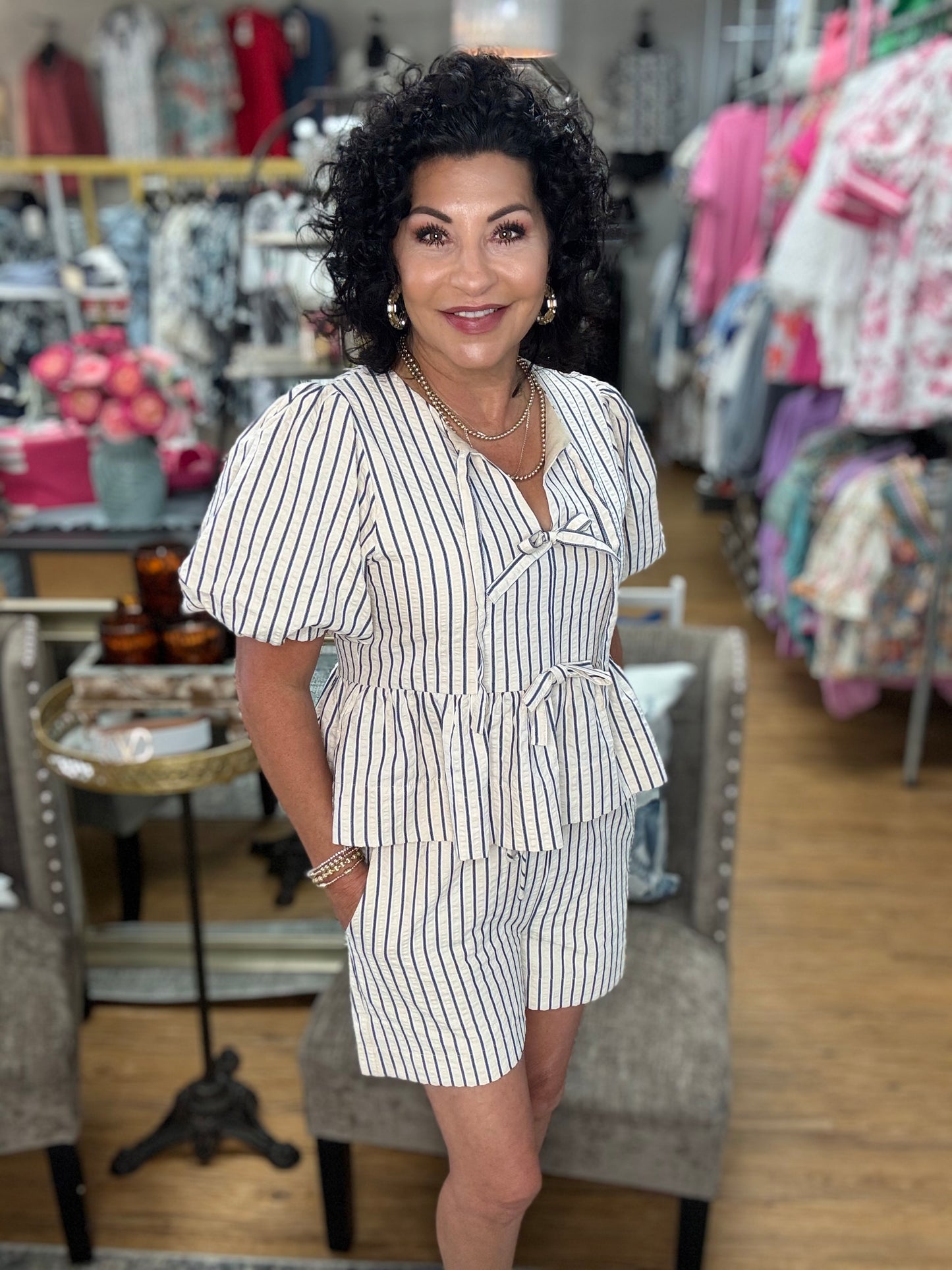 Striped high waisted pull on shorts. Elastic waistband. Pockets at side