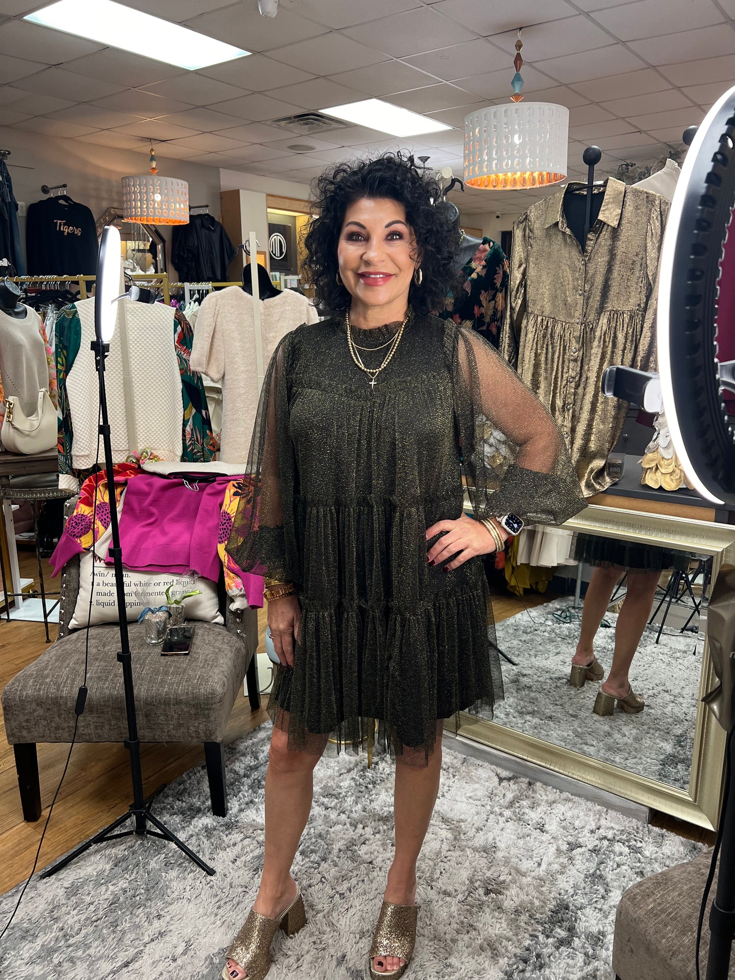Twinkle mesh dress with stretch-band neck, back key hole, long bishop sleeves, and frilled tiered layer. Hi