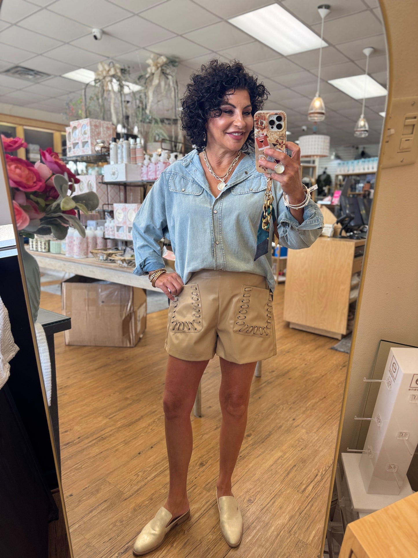 Solid high-waist shorts featuring grommet lace-up detail