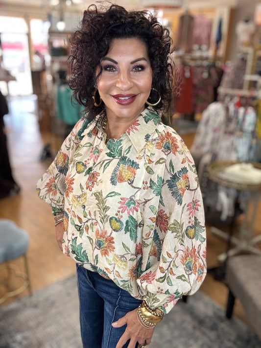 Floral print 3/4 sleeve button-down top featuring dropped shoulders
