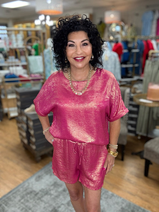 Metallic loungewear sets Top with U-neck, back inverted pleats, short dolman sleeves, and band cuffs. Bottoms are drawstring shorts with side pockets