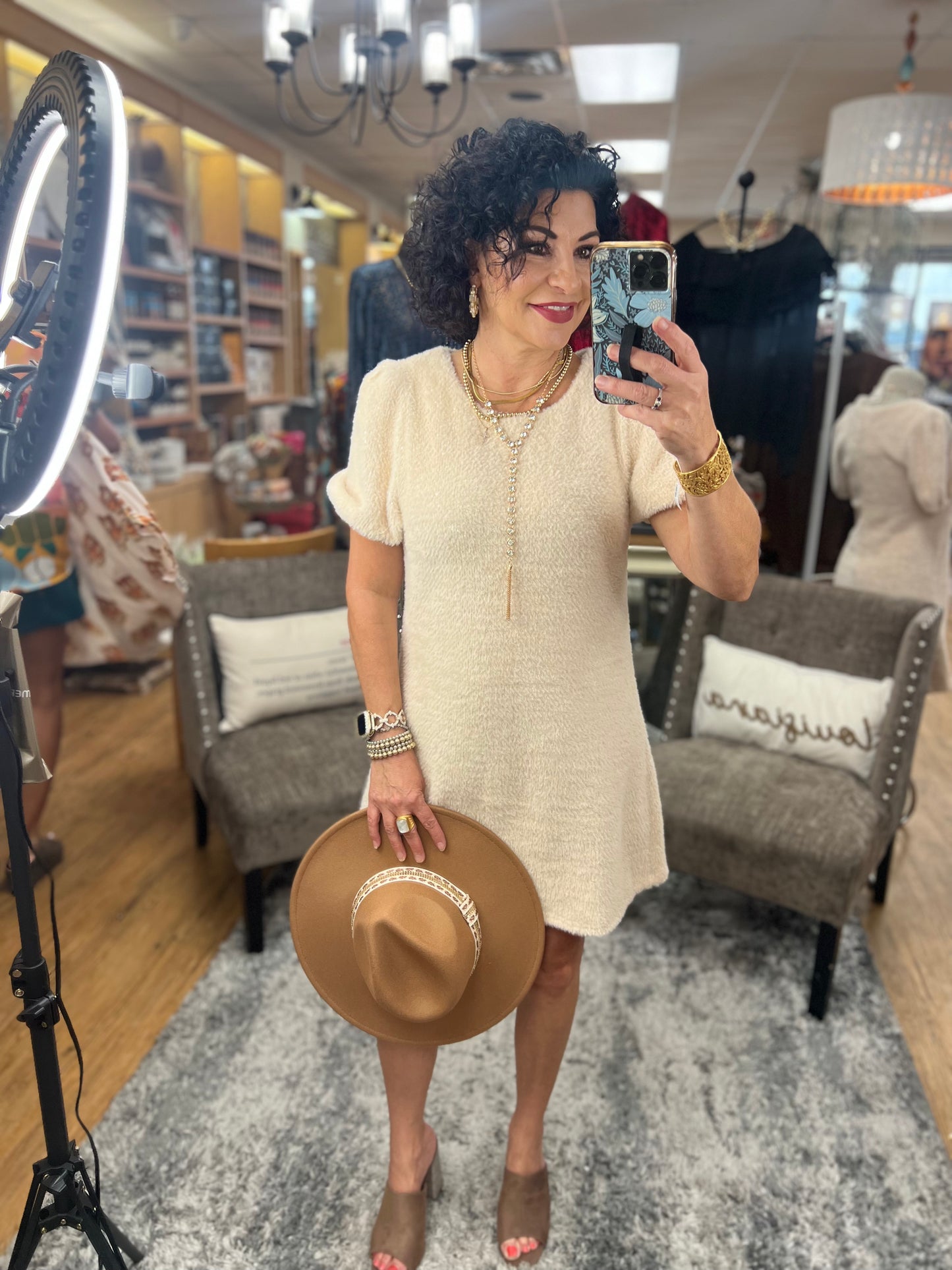 Solid knitted round neck bubble sleeve mini dress featuring zipper closure at back