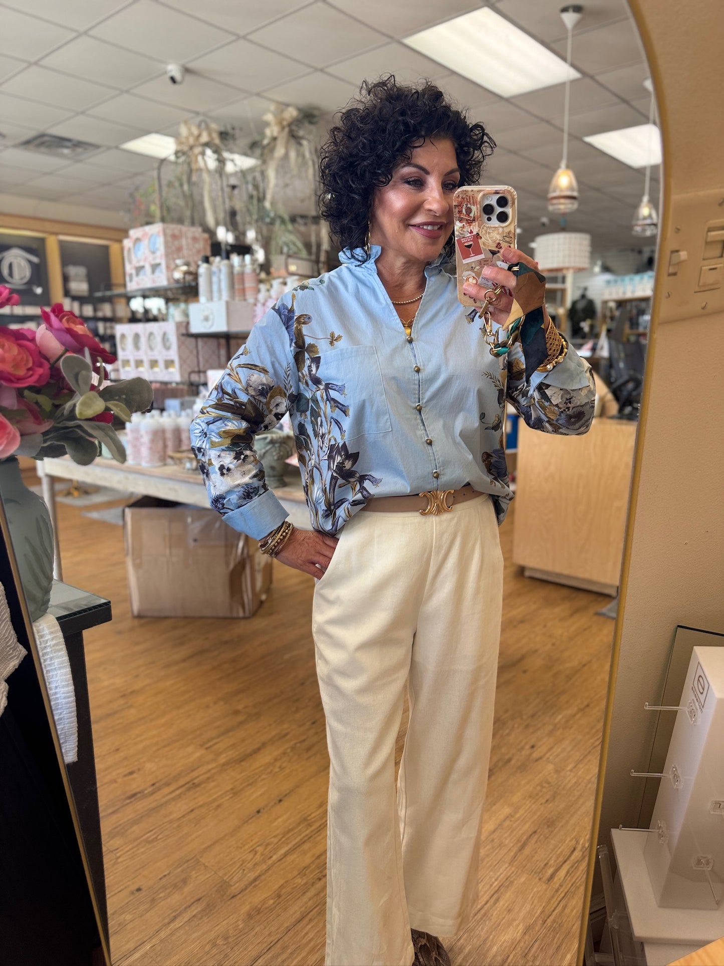 Floral print long shirt sleeve top featuring floral accent sleeves