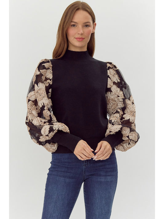 Ribbed knit top with mock neck, floral mesh puff sleeves, ribbing at the sleeve ends and hemline.