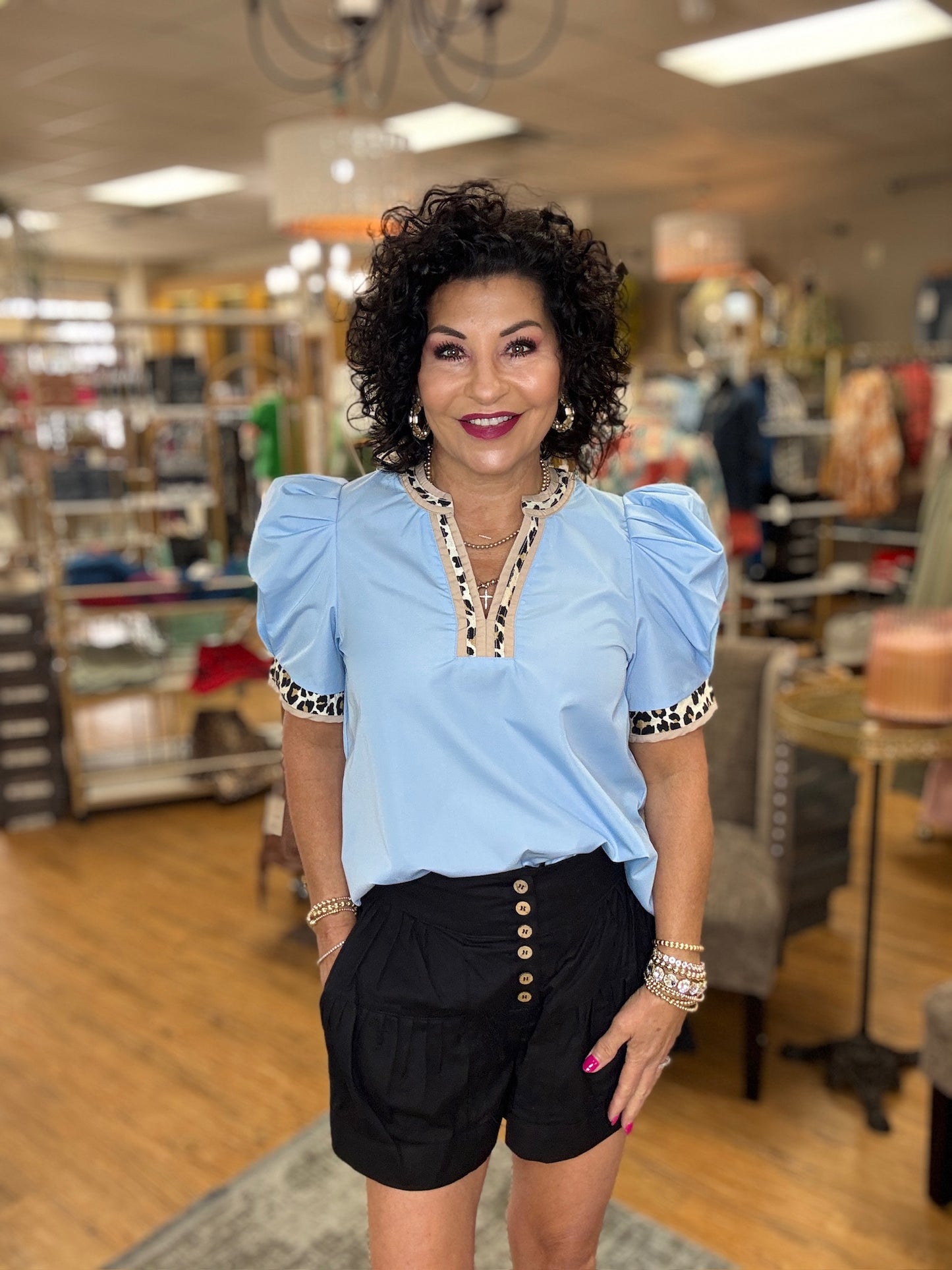 Blue top with animal print trim