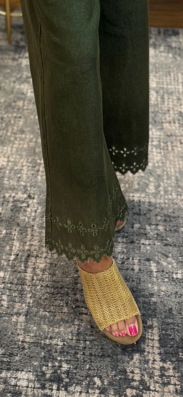 High waist ankle length pants featuring floral embroidered border hem