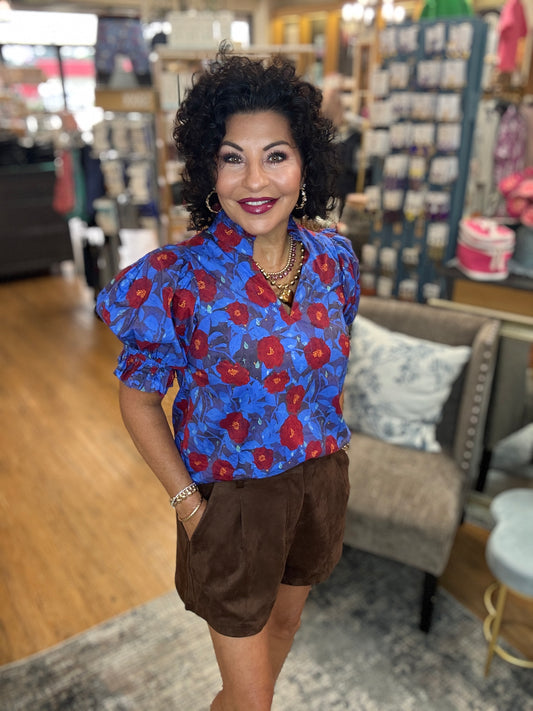 Floral pattern short puff sleeve pullover top featuring pleated ruffle V-neck