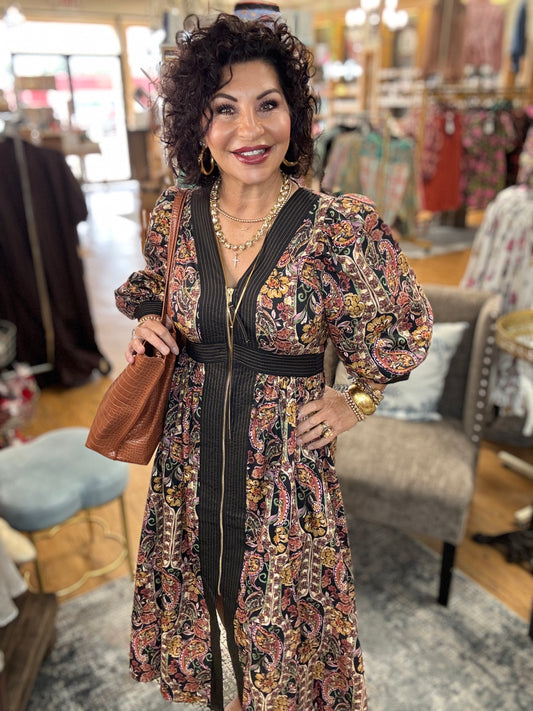 Paisley print puff sleeve midi dress featuring striped trim and partial front zipper closure