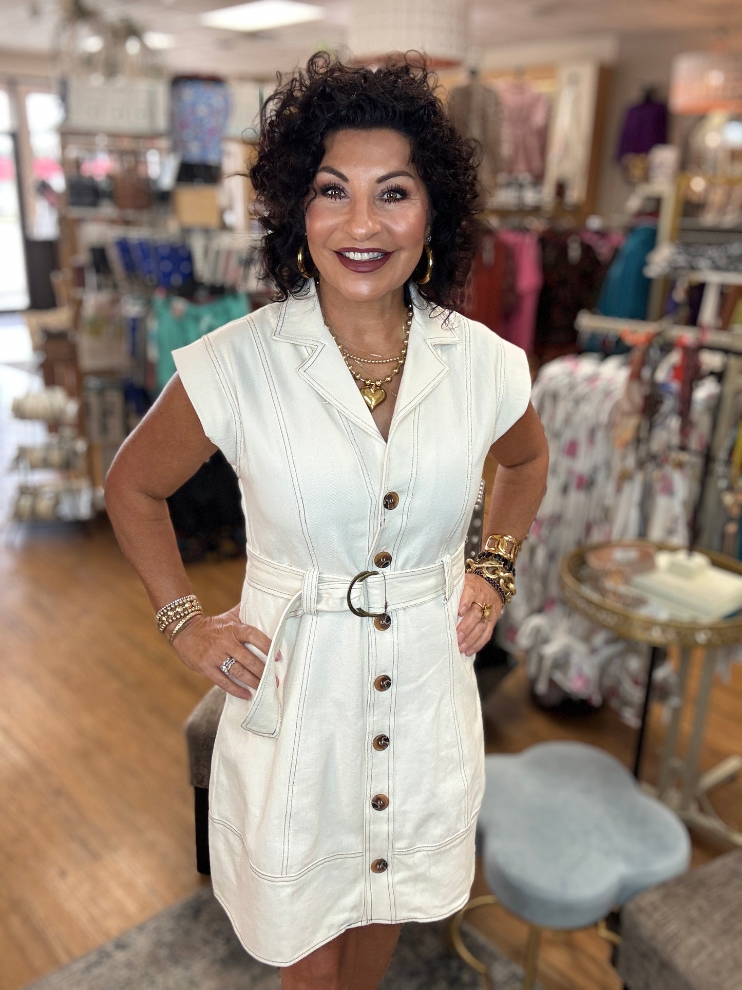 Solid sleeveless lapel self-belt mini dress featuring contrast accent stitch