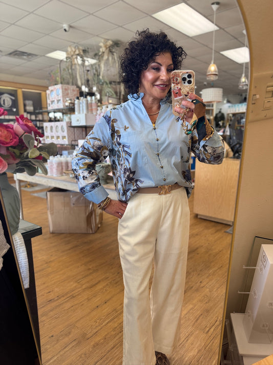 Floral print long shirt sleeve top featuring floral accent sleeves