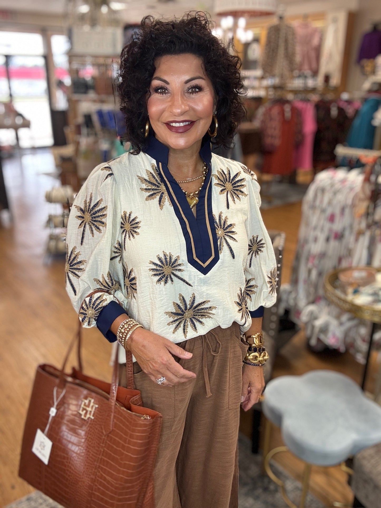 Botanical embroidery 3/4 puff sleeve top featuring contrast V-neck band