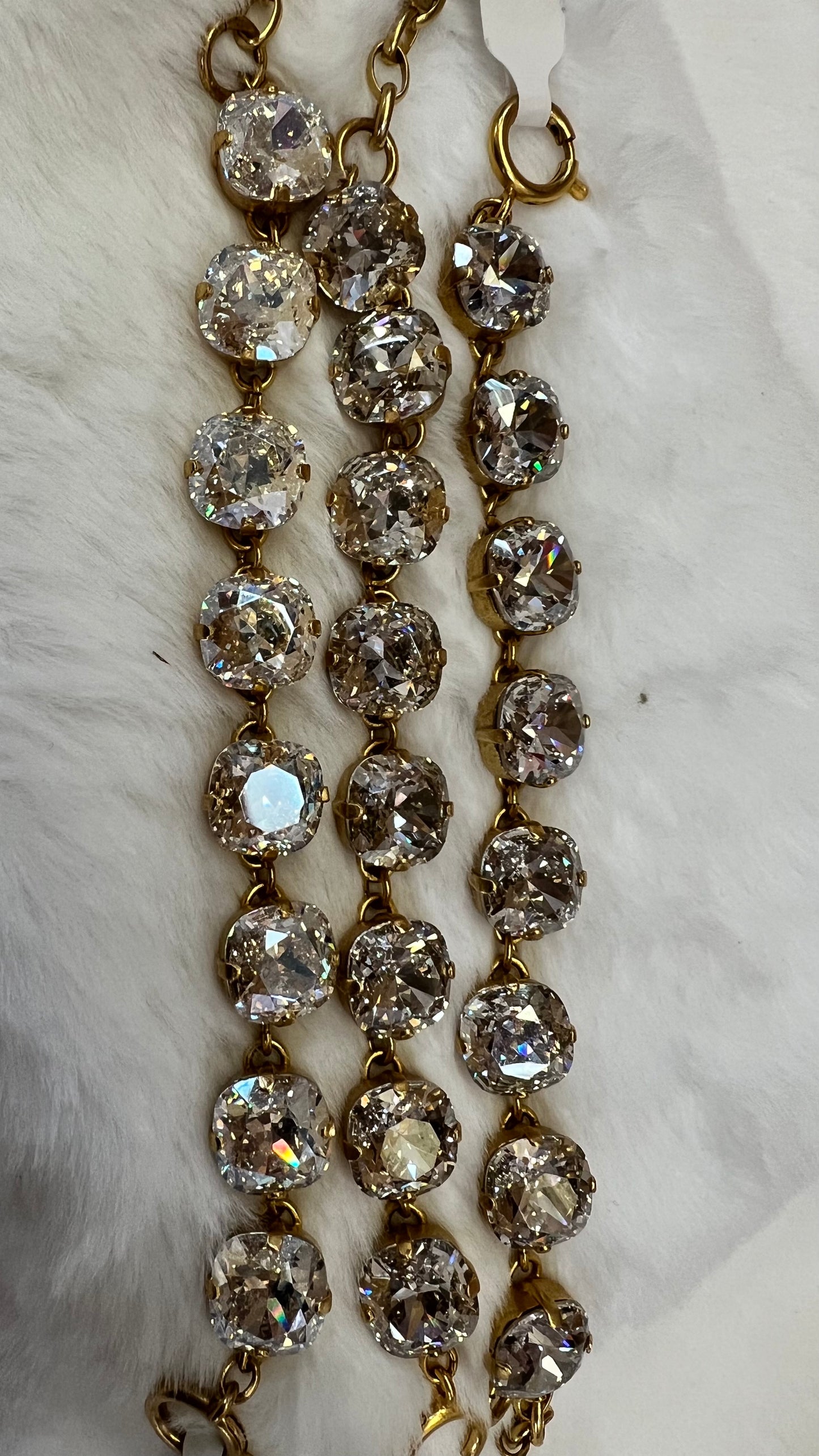 Catherine Popesco eight medium size Clear round crystals